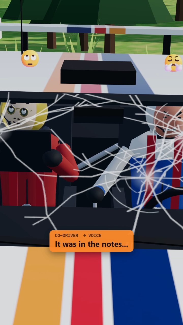 Driver and co-driver faces through a cracked windscreen